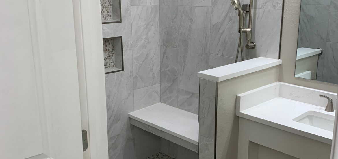 ADA accessible bathroom remodel with curbless shower and grab bars by Pro Tech Construction Austin TX