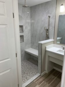 ADA accessible bathroom remodel with curbless shower and grab bars by Pro Tech Construction Austin TX