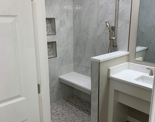 ADA accessible bathroom remodel with curbless shower and grab bars by Pro Tech Construction Austin TX