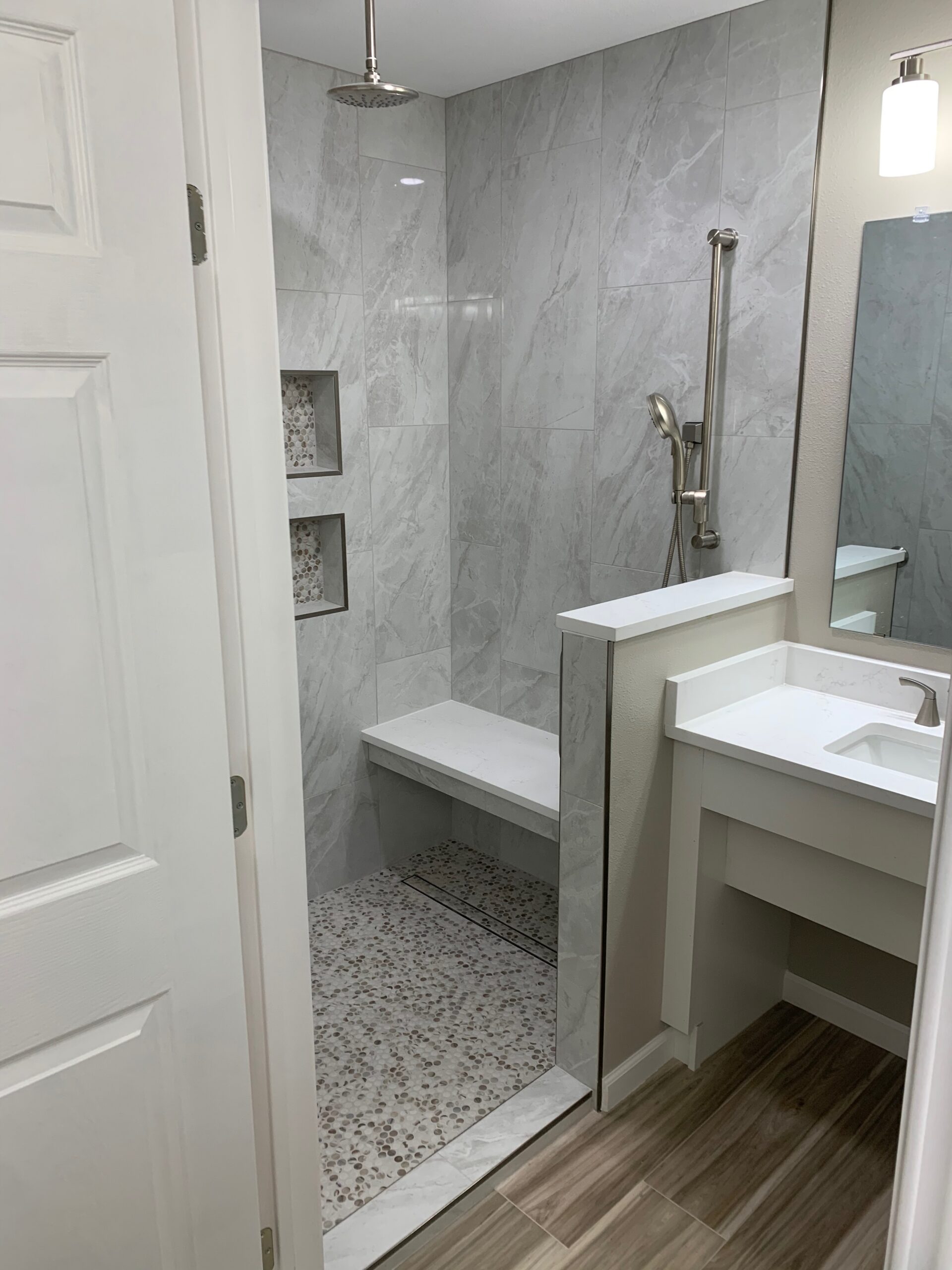 ADA accessible bathroom remodel with curbless shower and grab bars by Pro Tech Construction Austin TX